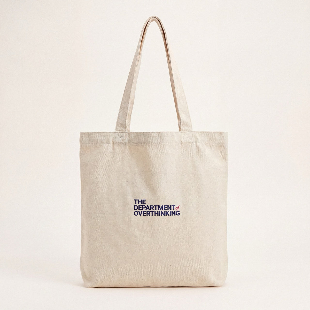 Navy recycled cotton tote bag with embroidered Department of Overthinking logo