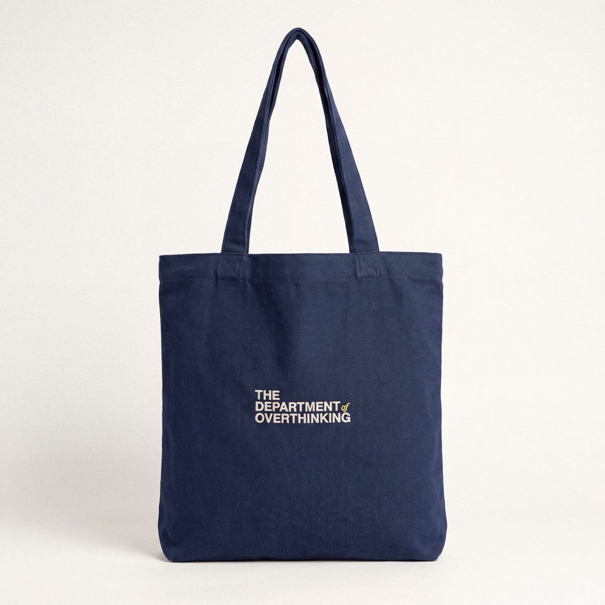 Navy recycled cotton tote bag with embroidered Department of Overthinking logo