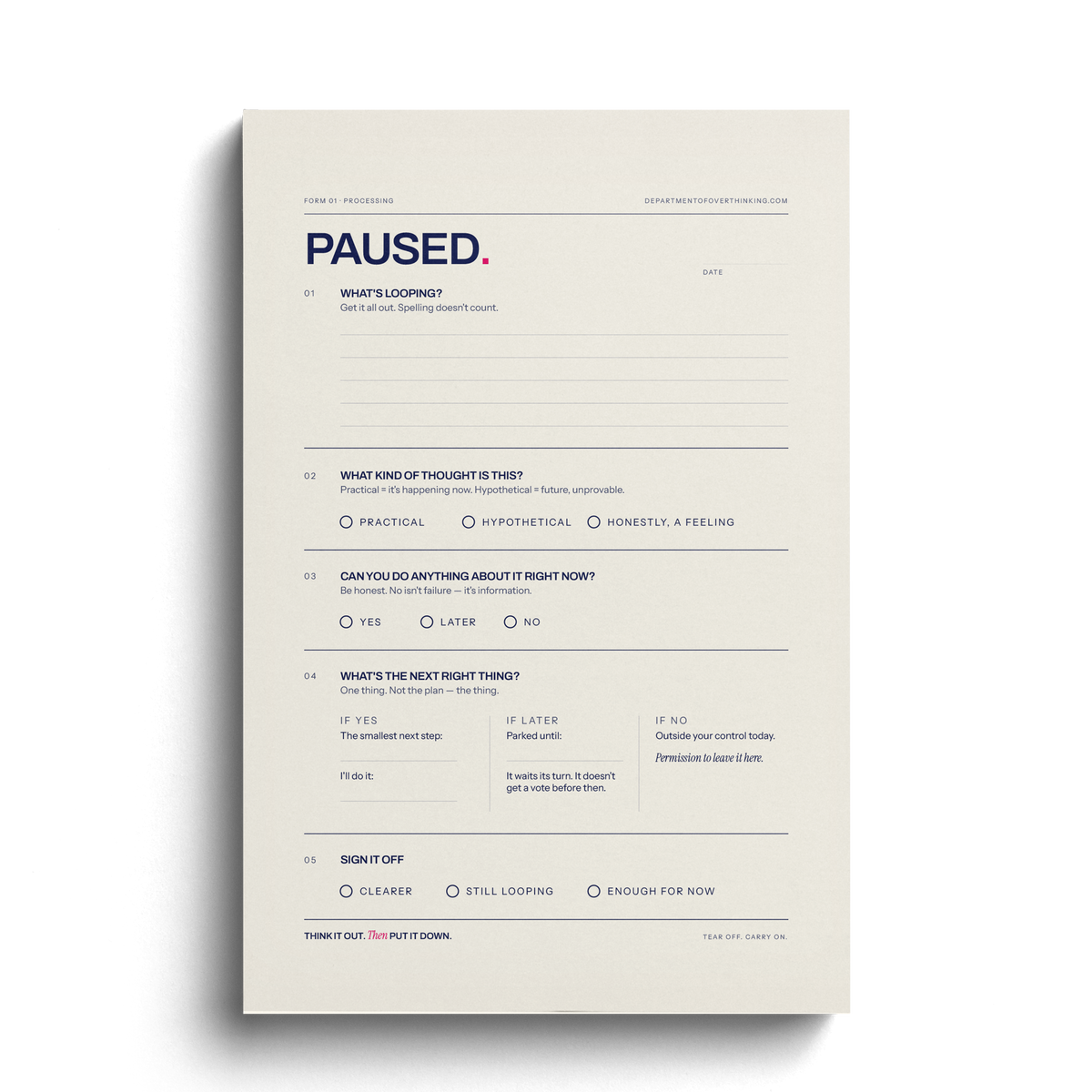 The physical PAUSED. tear-off thinking pad