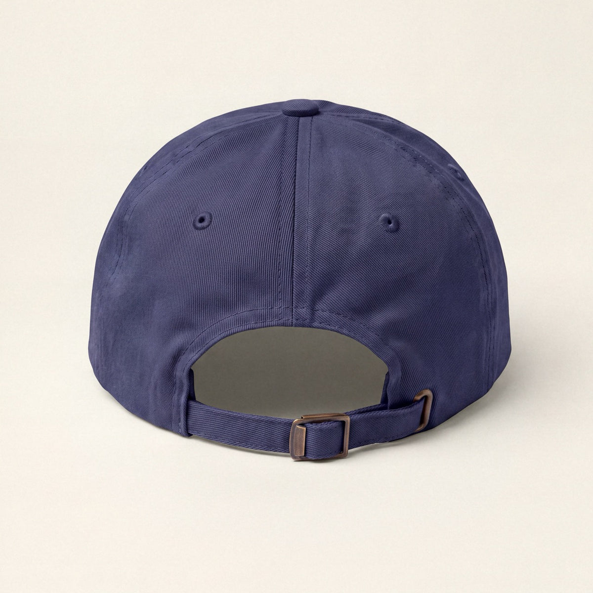 Back view of navy embroidered baseball cap with adjustable strap