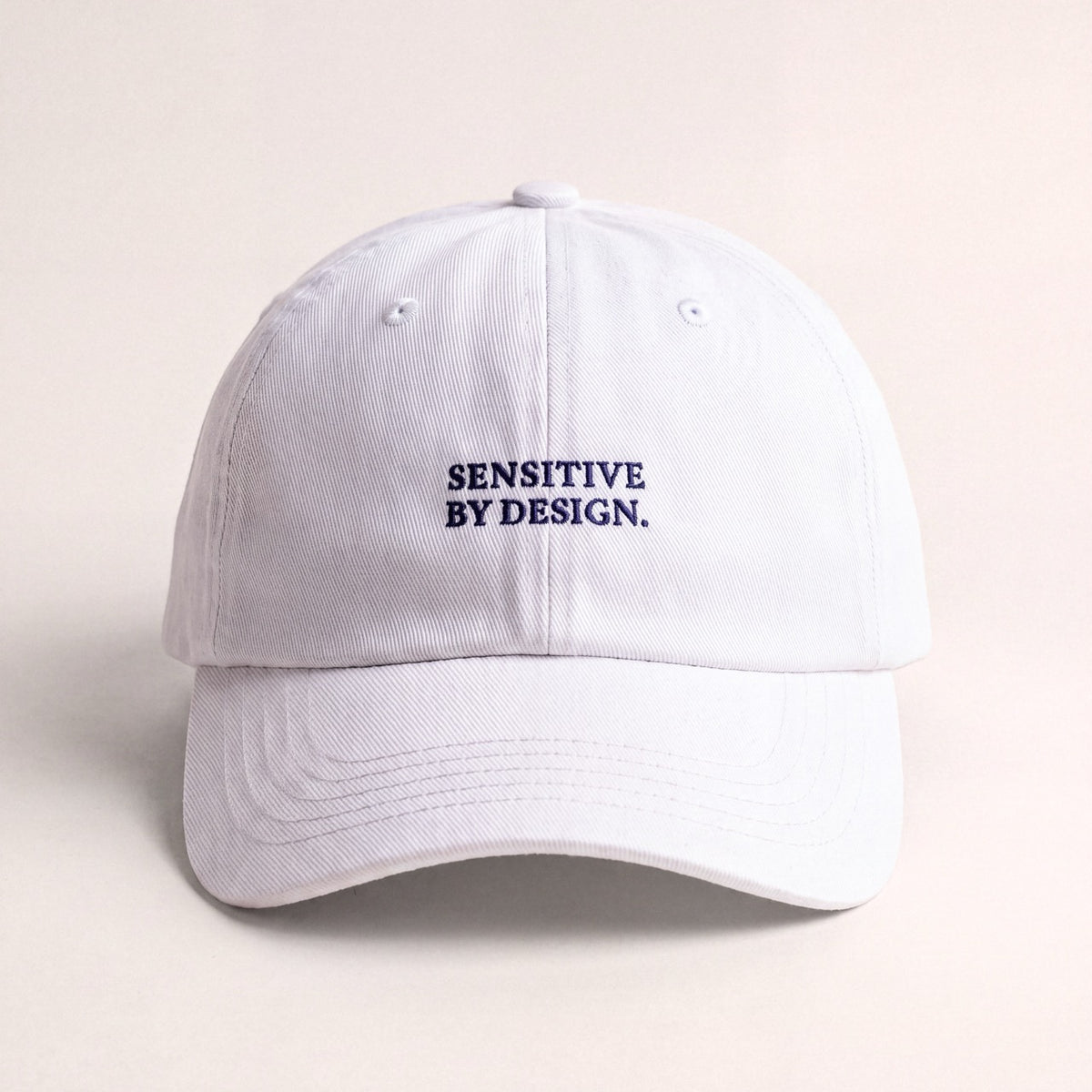 White embroidered Department of Overthinking baseball cap front view