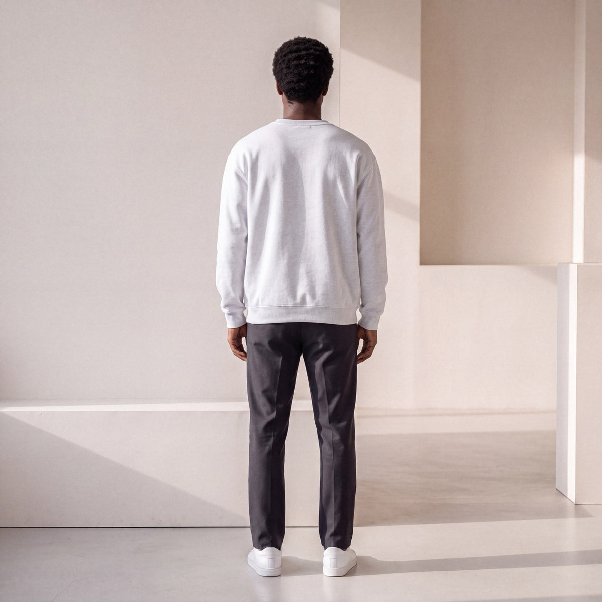 Back view of ash SENSITIVE BY DESIGN. crewneck sweatshirt